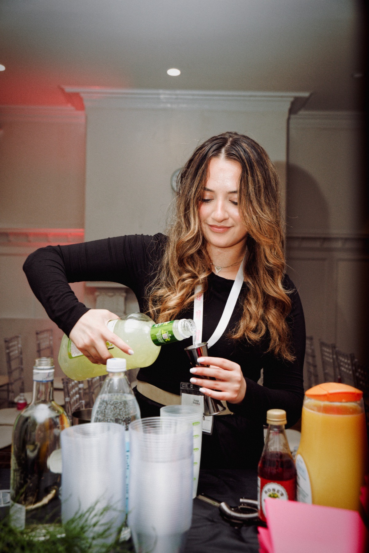 A vendor preparing drinks