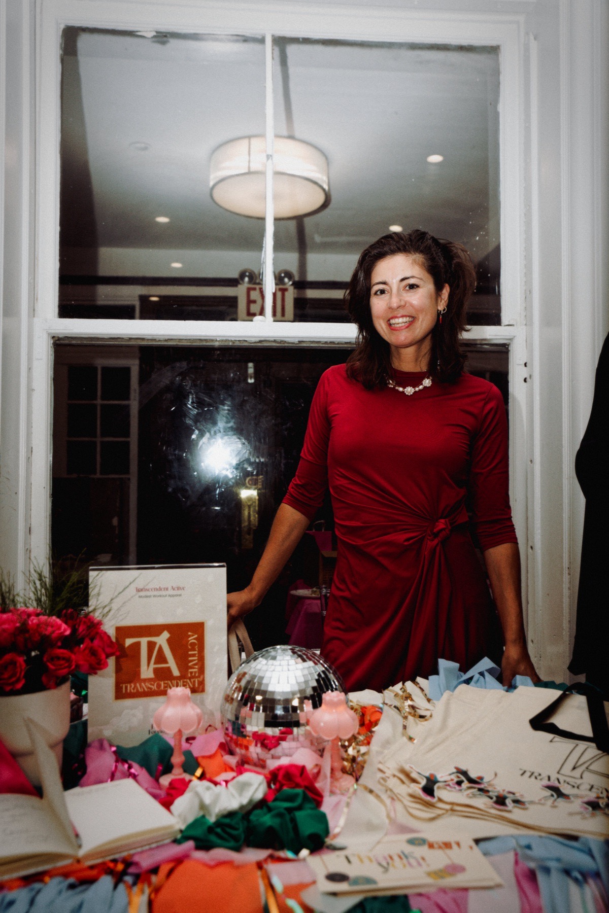 A business owner at her expo table