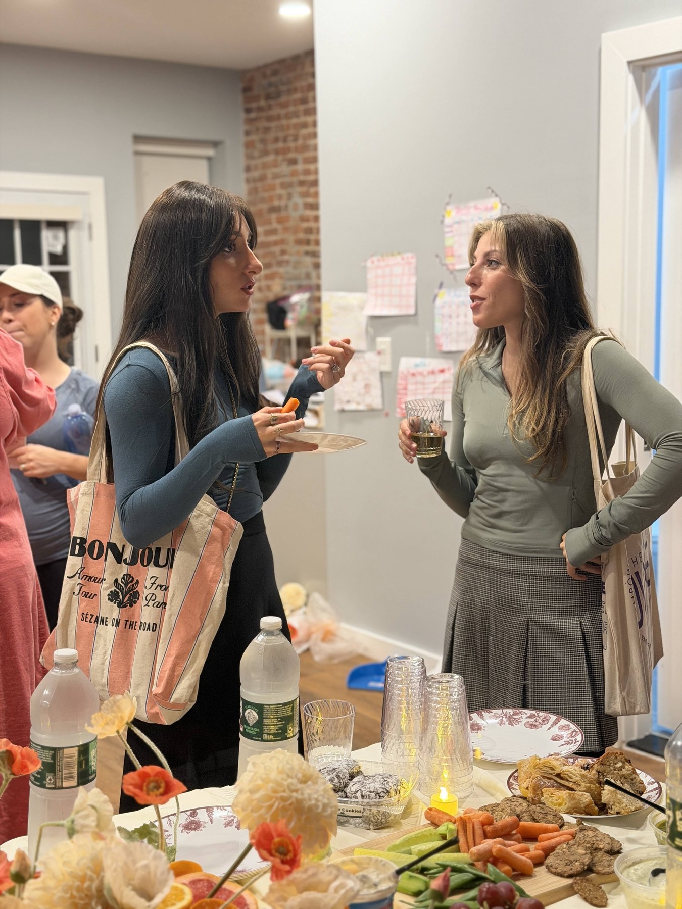 Guests connecting over refreshments at the event
