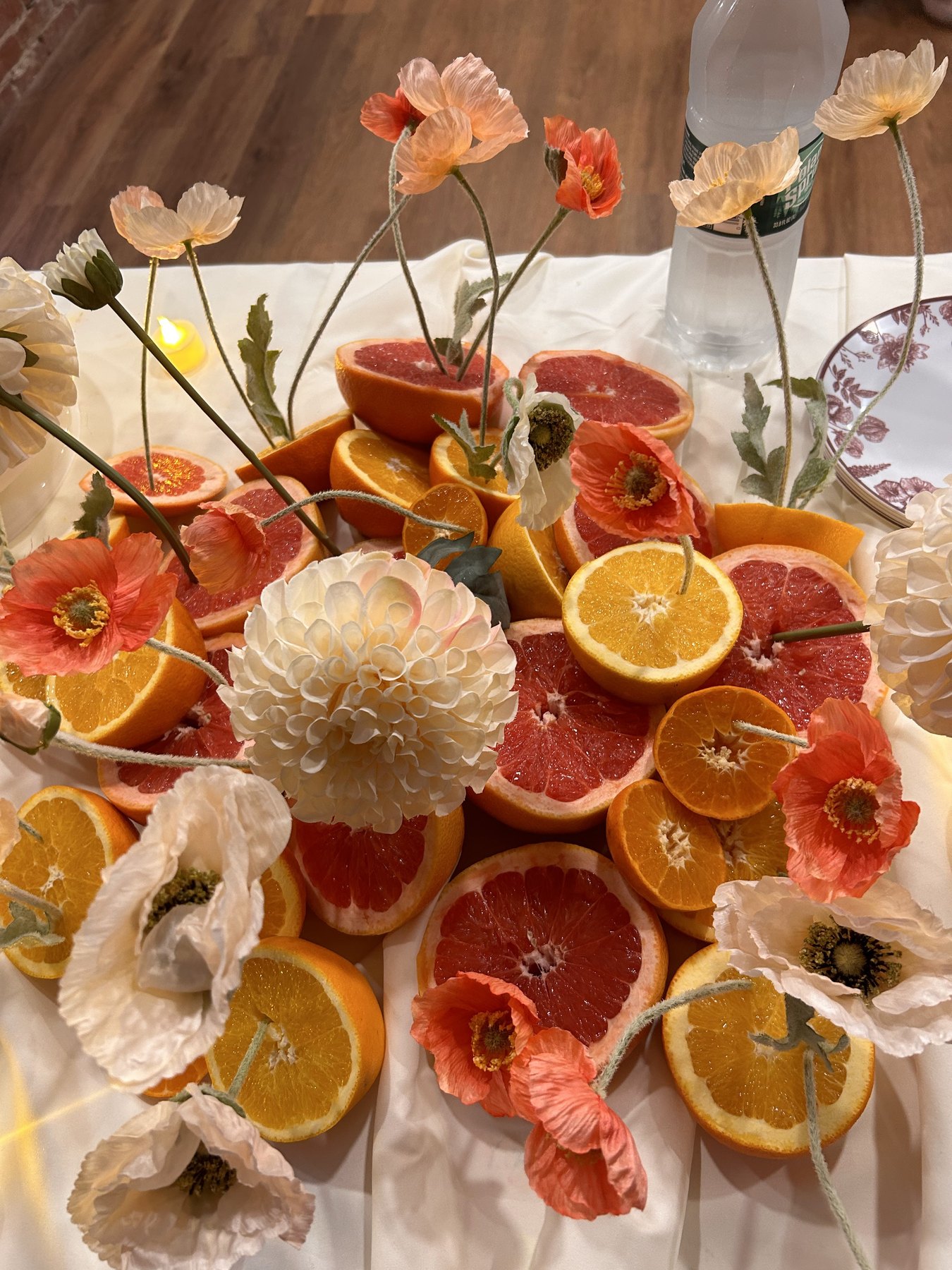 Citrus and floral table arrangement
