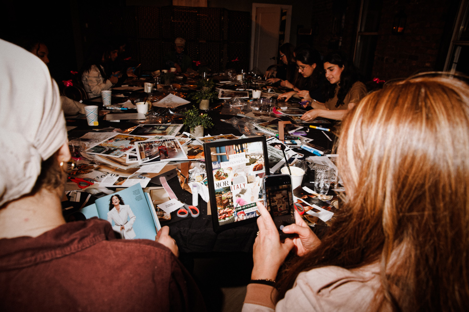 Guests making vision boards together