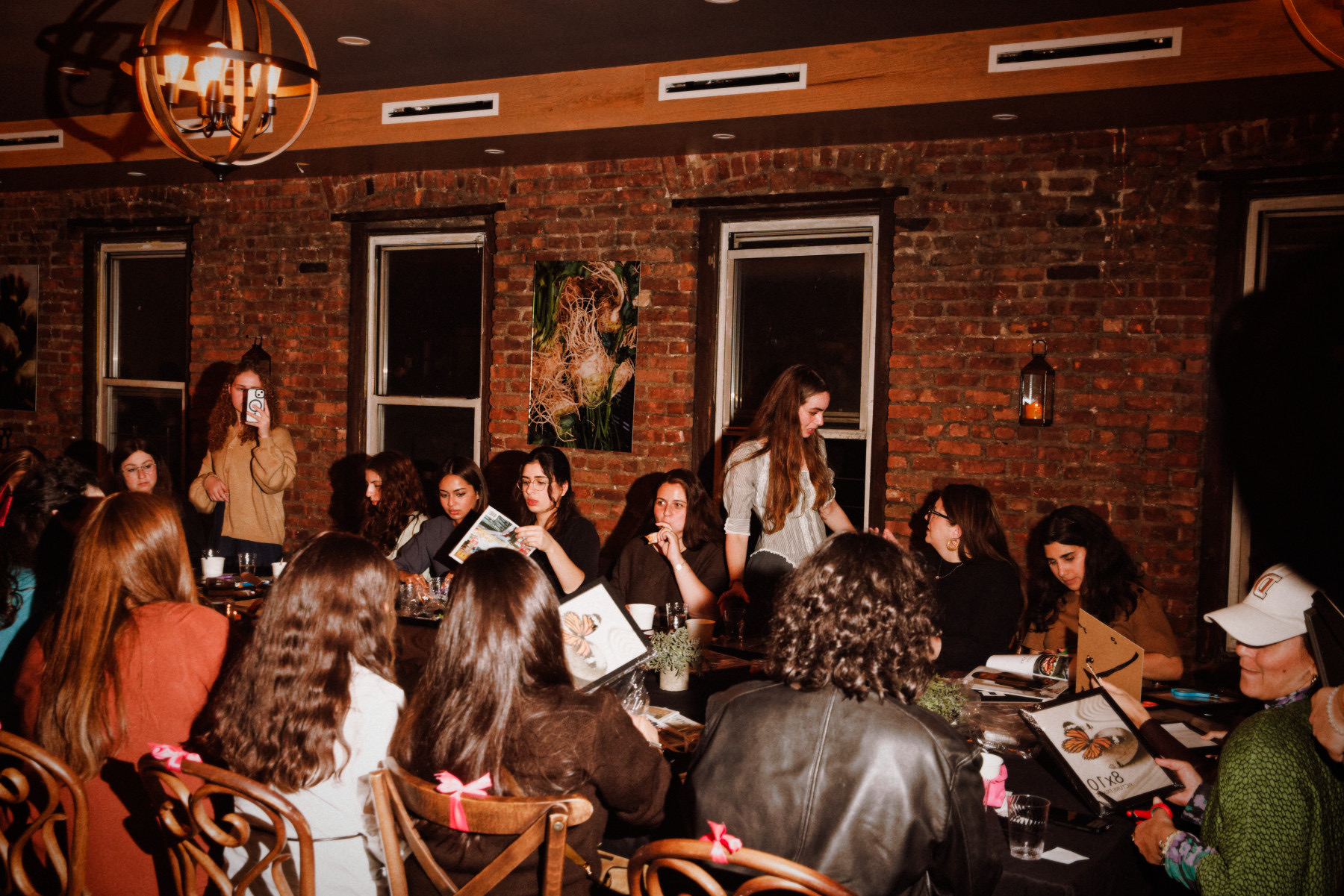 Guests working together around the table